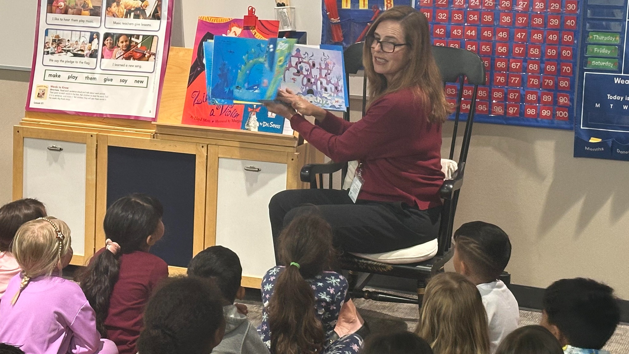 Katie reading to young students in an Irvine classroom